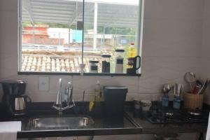 Casa próxima as Estátuas dos Três Pescadores