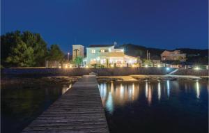 Four-Bedroom Holiday Home In Tkon