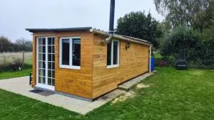 Chalet autonome à louer sur terrain de loisir de 2000m2 avec étang privé - Pontgouin