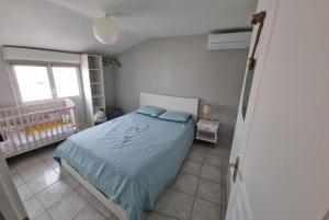 Maisons de vacances Maison : photos des chambres