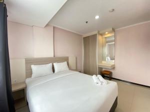 Beautiful and Clean 2BR Apartment at Gateway Pasteur Bandung By Travelio