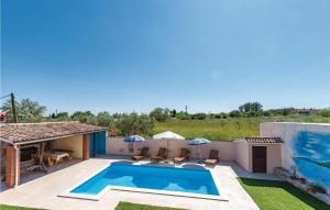 Two-Bedroom Holiday Home In Divsici