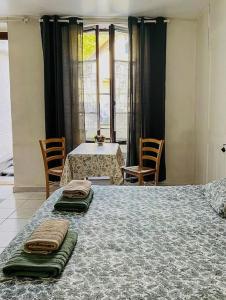 Appartements L-Aquarium, parking gratuit, garage moto et velo : photos des chambres