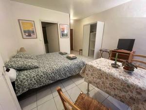 Appartements L-Aquarium, parking gratuit, garage moto et velo : photos des chambres