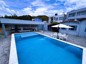 Casa em Capitólio com piscina e vista para lago | W1