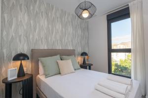 Málaga Piso nuevo amplio luminoso 3 hab vistas wifi y parking privado