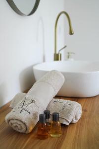 Appartements NUXIA Suites&SPA L-Aboheme Chic : photos des chambres