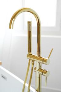 Appartements NUXIA Suites&SPA L-Aboheme Chic : photos des chambres