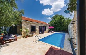 Two-Bedroom Holiday Home In Pridraga