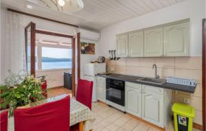 Cozy Apartment In Barbat-Rab With House Sea View 