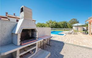 Beautiful Home In Plomin With Kitchen 