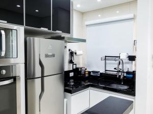 Apto beira mar Toninhas em condomínio