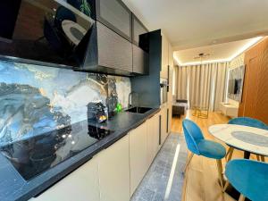 Appartements L-Escale - CDG - Parking - Confort : photos des chambres