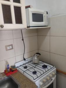 Departamento 4 personas en edificio frente al mar