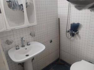 Departamento 4 personas en edificio frente al mar