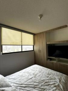 Departamento cerca del centro con vista al mar