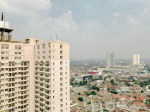 Simply Studio Room Apartment Margonda Residences 5 By Travelio