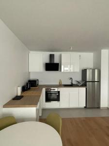 Appartements Appartement cosy, proche transports Paris : photos des chambres