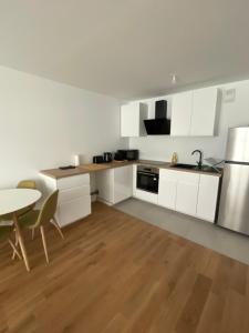 Appartements Appartement cosy, proche transports Paris : photos des chambres