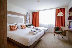 Hotels Novotel Lyon Centre-Confluence Bord de Saone : photos des chambres