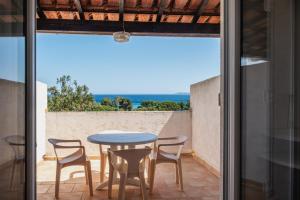 Family Room with a Terrace - Sea View room in Hôtel Beau Site