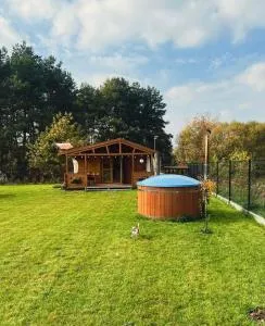 Domek letniskowy z jacuzzi nad rzeką Bzurą - Zduny