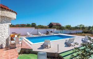 Four-Bedroom Holiday Home In Cista Velika