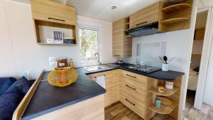 Campings EA - Votre sejour detente, 3 ch, 2 SDB, proche plages et parc aquatique : photos des chambres