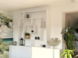 Villa Bel-Odet, appartements modernes au calme, terrasses pour les T2, grand jardin et parking gratuit, a 5 min des plages de Benodet : photos des chambres