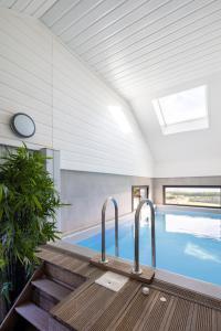 Villas La villa sur la baie vue imprenable et piscine interieure 29 degres : photos des chambres