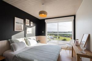 Villas La villa sur la baie vue imprenable et piscine interieure 29 degres : photos des chambres