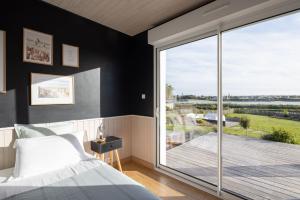 Villas La villa sur la baie vue imprenable et piscine interieure 29 degres : photos des chambres