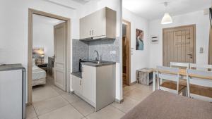 Junior Suite (Triple) Bedroom & Living Room room in Erato Hotel