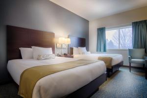 Deluxe Queen Room with Two Queen Beds room in Sun & Ski Inn and Suites