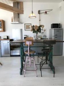 Maisons de vacances Le Nid du Heron, maison avec piscine chauffee privative au coeur de Nantes : photos des chambres
