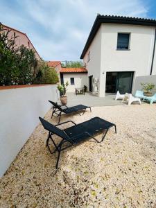 Appartements La contemporaine 2 chambres a Ste Marie : Villa - Vue sur Jardin