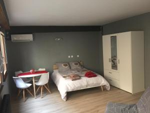 Grande Chambre Climatisée 1 à 4 couchages