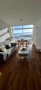 Piso primera línea de playa y vistas al mar en Cariño