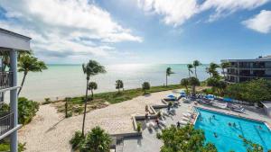 Neptunes Penthouse by Last Key Realty