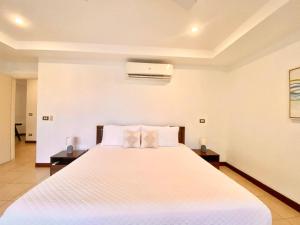 Peninsula 46 - Upscale 2bdr with Jacuzzi - Beach - Fast wifi - Gym