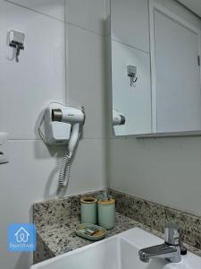 Quarto e Sala Aconchegante no Barra Conceito