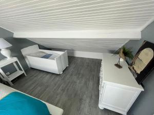 Maisons de vacances Les pieds dans l-eau - Cosqueville Vicq-mer : photos des chambres