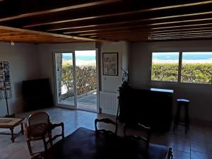 Maisons de vacances Les pieds dans l-eau - Cosqueville Vicq-mer : photos des chambres