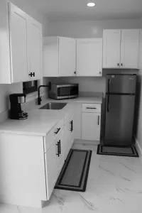 MG Realty - Opa-locka