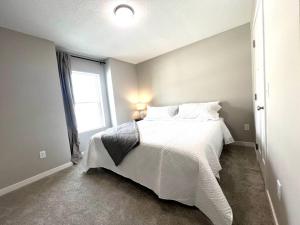 Central Cedar Falls Townhome - King Beds!