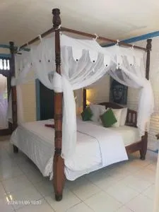 Puri Oka Beach Bungalows - 卡朗阿森