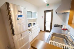 ゲストハウス かなぐすくミント