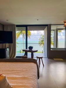 Casa Waua | PÉ NA AREIA, rooftop, borda infinita
