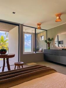 Casa Waua | PÉ NA AREIA, rooftop, borda infinita