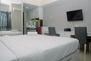 Cozy Studio Room Taman Melati Margonda Apartment By Travelio